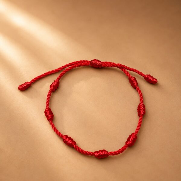 WhatsApp Image 2026-08-18 at 1.35.39 PM (1) PULSERA 7 NUDOS